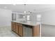 Open concept kitchen with island and stainless steel appliances at 40925 W Patricia Ln, Maricopa, AZ 85138