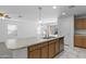 Kitchen island with double sink and stainless steel dishwasher at 40925 W Patricia Ln, Maricopa, AZ 85138