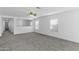 Bright living area with neutral walls and carpet at 40925 W Patricia Ln, Maricopa, AZ 85138