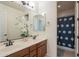 Bathroom with double vanity and shower/tub combo at 4510 N Pierce Ct, Buckeye, AZ 85396