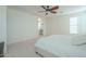 Comfortable bedroom with ensuite bathroom and large bed at 4510 N Pierce Ct, Buckeye, AZ 85396