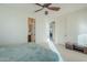 Bedroom with ensuite and access to another room at 4510 N Pierce Ct, Buckeye, AZ 85396