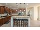 Spacious kitchen with island, stainless steel appliances, and granite countertops at 4510 N Pierce Ct, Buckeye, AZ 85396