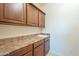Laundry room with cabinets and countertop at 4510 N Pierce Ct, Buckeye, AZ 85396