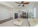 Spacious living room with hardwood floors and a view into an adjacent office at 4510 N Pierce Ct, Buckeye, AZ 85396