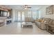 Relaxing living room featuring comfortable seating and access to the backyard at 4510 N Pierce Ct, Buckeye, AZ 85396