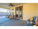 Covered patio with comfortable seating and access to the backyard at 4510 N Pierce Ct, Buckeye, AZ 85396
