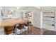 Modern kitchen with white cabinets, butcher block island, and stainless steel appliances at 4518 W Rose Ln, Glendale, AZ 85301