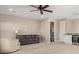 Finished basement with sitting area and fireplace at 5273 N 207Th Dr, Buckeye, AZ 85396
