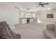 Spacious basement recreation area with fireplace at 5273 N 207Th Dr, Buckeye, AZ 85396