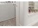Partially visible bathroom with white vanity at 5273 N 207Th Dr, Buckeye, AZ 85396