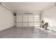 Spacious garage with overhead storage at 5273 N 207Th Dr, Buckeye, AZ 85396