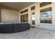 Covered patio with seating area and view of backyard at 5273 N 207Th Dr, Buckeye, AZ 85396