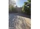 Spacious backyard with paved patio and mature plants at 815 W Kiva Ave, Mesa, AZ 85210