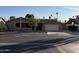 Single-story house with a two-car garage and desert landscaping at 815 W Kiva Ave, Mesa, AZ 85210