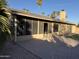 Back patio features a covered area and brick pavers at 815 W Kiva Ave, Mesa, AZ 85210