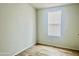 Simple bedroom with wood-look floors and window coverings at 9431 E Coralbell Ave # 124, Mesa, AZ 85208
