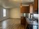Open kitchen with light wood cabinets and island at 9431 E Coralbell Ave # 124, Mesa, AZ 85208