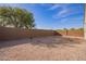 Backyard with gravel and a block wall at 1241 E Paul Dr, Casa Grande, AZ 85122