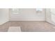 Simple bedroom with neutral carpet and window blinds at 1241 E Paul Dr, Casa Grande, AZ 85122