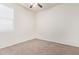 Bright bedroom with neutral walls and carpet at 1241 E Paul Dr, Casa Grande, AZ 85122