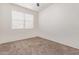 Bright bedroom with window blinds and neutral carpeting at 1241 E Paul Dr, Casa Grande, AZ 85122