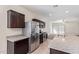 Modern kitchen with stainless steel appliances and granite countertops at 1241 E Paul Dr, Casa Grande, AZ 85122