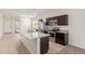 Island kitchen with granite countertops and stainless steel appliances at 1241 E Paul Dr, Casa Grande, AZ 85122