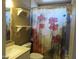Bathroom with shower/tub combo and updated vanity at 3736 W Paradise Ln, Phoenix, AZ 85053