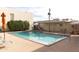 Community pool with lounge chairs and covered seating at 3828 N 32Nd St # 104, Phoenix, AZ 85018