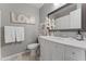 Clean bathroom with white vanity, mirror, and tiled floor at 4494 E Brae Voe Way, San Tan Valley, AZ 85140