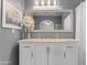 Elegant bathroom with a white vanity, marble countertop, and large mirror at 4494 E Brae Voe Way, San Tan Valley, AZ 85140