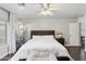 Spacious bedroom with a large bed and plenty of natural light at 4494 E Brae Voe Way, San Tan Valley, AZ 85140