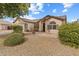 Single story home with front yard landscaping and a paved patio at 4494 E Brae Voe Way, San Tan Valley, AZ 85140