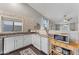 Kitchen with white cabinets, stainless steel appliances, and wood flooring at 4494 E Brae Voe Way, San Tan Valley, AZ 85140
