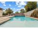 Refreshing blue swimming pool with spacious surrounding patio at 4494 E Brae Voe Way, San Tan Valley, AZ 85140
