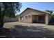 Backyard with gravel and covered patio at 6709 W Luke Ave, Glendale, AZ 85303
