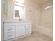 Clean bathroom with white vanity and bathtub at 6709 W Luke Ave, Glendale, AZ 85303