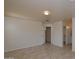 Bedroom with double door closet and access to bathroom at 6709 W Luke Ave, Glendale, AZ 85303
