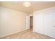 Bedroom with large closet and window with blinds at 6709 W Luke Ave, Glendale, AZ 85303
