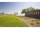 Anthem Del Webb community entrance with landscaping and fountain at 7674 W Cactus Wren Way, Florence, AZ 85132