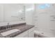 Bathroom with granite vanity and shower/tub combo at 8391 W Mantle Way, Florence, AZ 85132