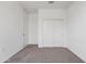 Spacious bedroom with double door closet and carpet at 8391 W Mantle Way, Florence, AZ 85132