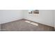Bright bedroom with neutral carpeting and window at 8391 W Mantle Way, Florence, AZ 85132