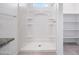 Large walk-in shower with built-in shelving at 8391 W Mantle Way, Florence, AZ 85132