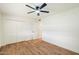 Bright bedroom with wood floors and double closet at 10404 W Audrey Dr, Sun City, AZ 85351