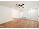 Spacious living area with hardwood floors and ceiling fan at 10404 W Audrey Dr, Sun City, AZ 85351