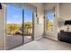 Bedroom with sliding glass doors leading to a patio at 10821 E Tusayan Trl, Scottsdale, AZ 85255