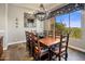 Elegant dining room features a large wood table, chandelier, and scenic views at 10821 E Tusayan Trl, Scottsdale, AZ 85255