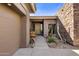 Inviting entryway with stone and wood accents at 10821 E Tusayan Trl, Scottsdale, AZ 85255